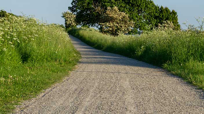 gravel road - roads: base stabilization - OxyChem calcium chloride