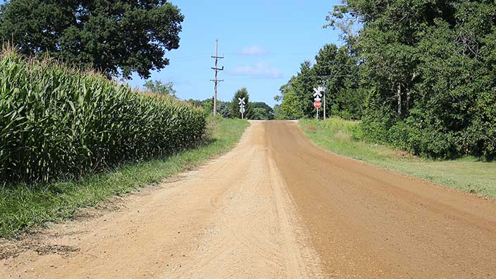 gravel road - roads: dust control - OxyChem calcium chloride