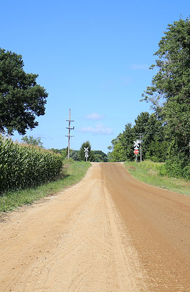 gravel road - roads: dust control - OxyChem calcium chloride