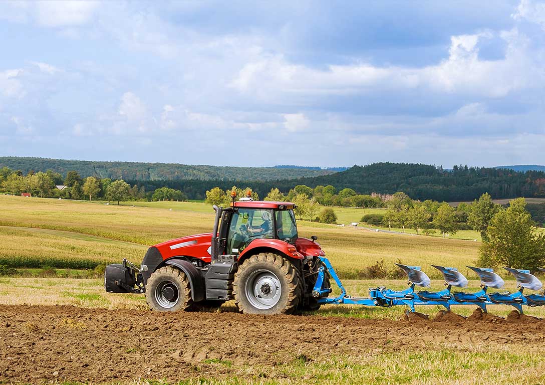 tractor in field - tire weighting - OxyChem calcium chloride